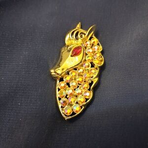 Elegant Gold Tone Horse Brooch